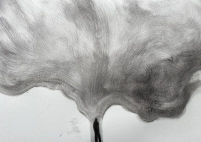 Charcoal drawing of a figure with an erupting mass above their head by Claire Cansick